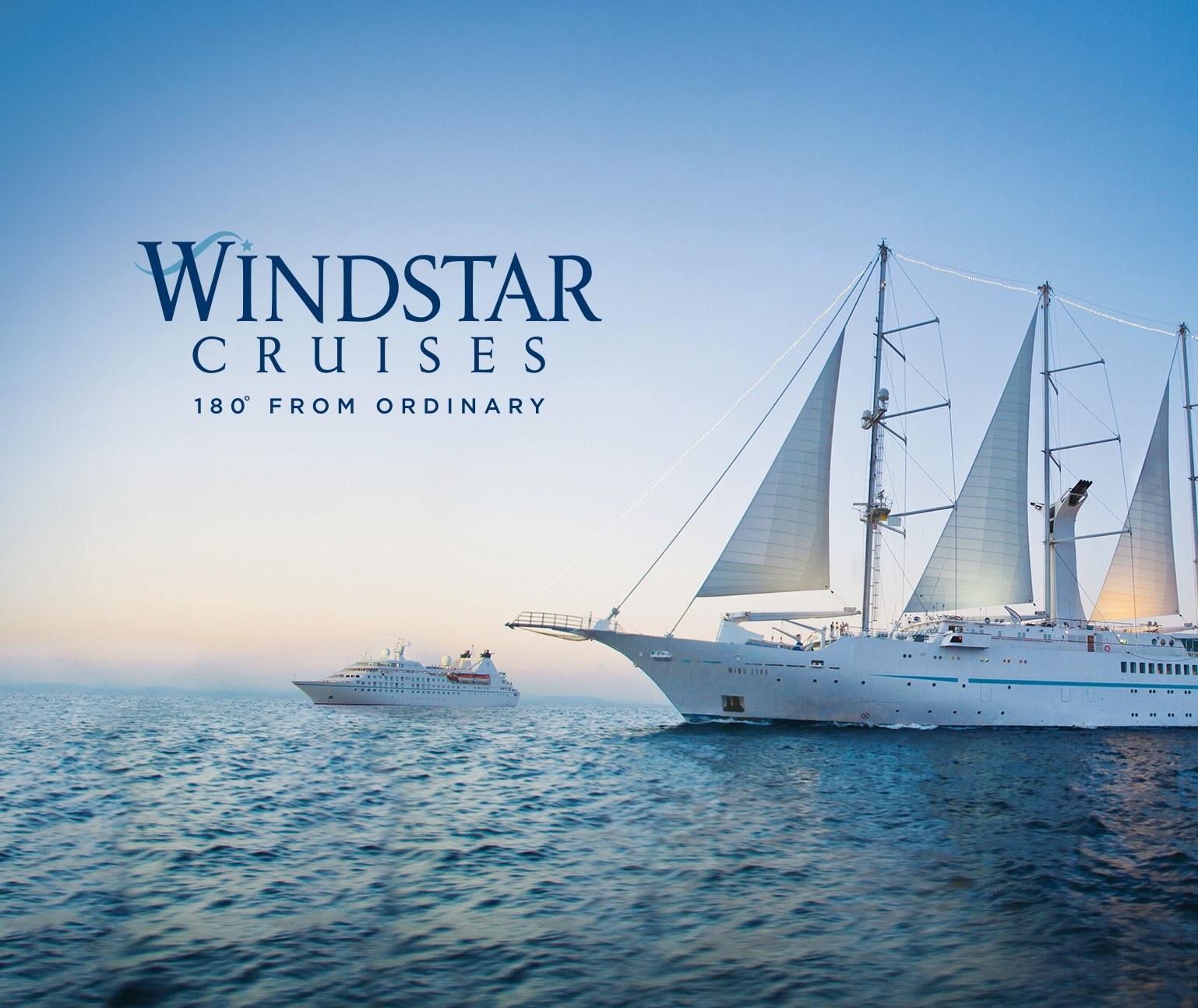 Large cruise ship with sails and Windstar Cruises logo